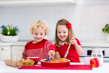 Kids baking apple pie