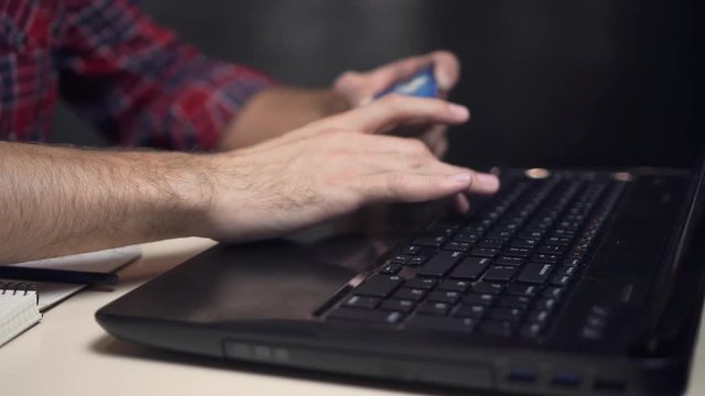 Man Making Online Payment with Credit Card