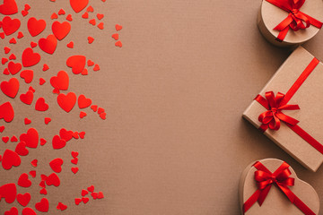 Background of gift boxes and red hearts.