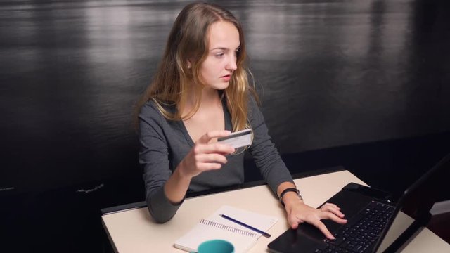 Girl Making Online Payment with Credit Card