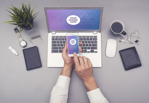 Laptop and Smartphone with User at Gray Desk Mockup 4