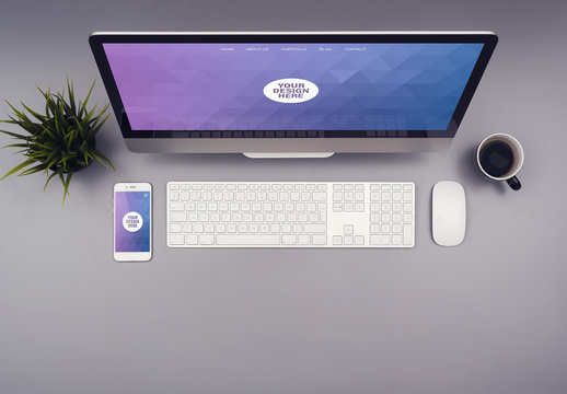 Desktop Computer and Smartphone on a Gray Desk Mockup 1