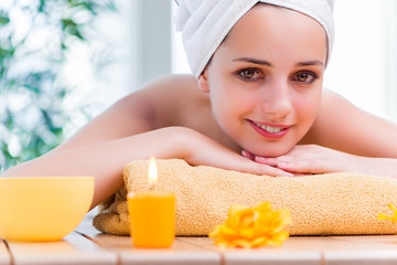 Young woman in spa health concept 