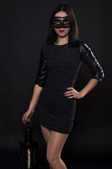 girl in a black mask