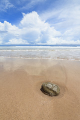 Waves sand beach and clouds sunny day
