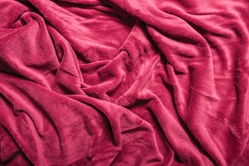 Soft red fabric background.