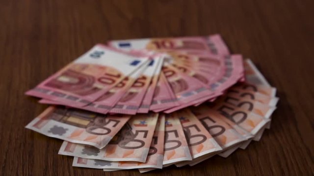 Scattered many Euro on Table