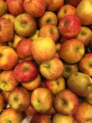 Apples background on a market
