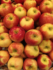 Apples background on a market
