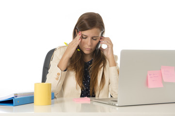 businesswoman suffering stress at office computer desk looking worried depressed and overwhelmed