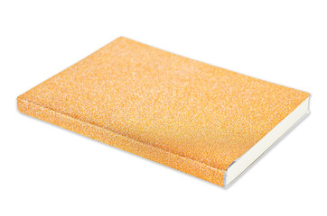 Golden note book isolated.