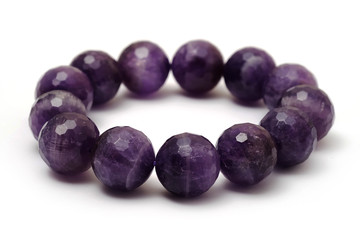 Lucky Amethyst quartz stone bracelet with white isolated background