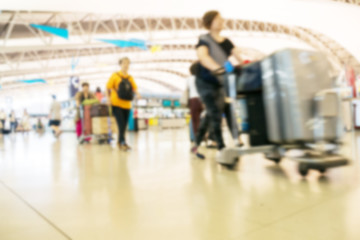 People traveling at airport terminal in blurred motion with retro color effected, Abstract blur people background