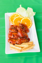 Chicken in a sauce of tomato and pepper