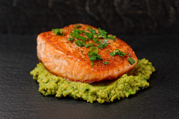 Grilled salmon fillet with avocado mash