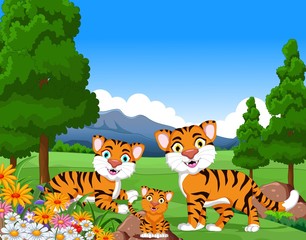 Obraz na płótnie Canvas tiger cartoon family in the jungle