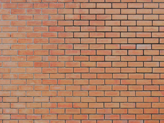 Background of old vintage orange brick wall for background texture