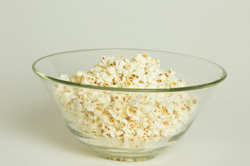 popcorn on white in glass bowl