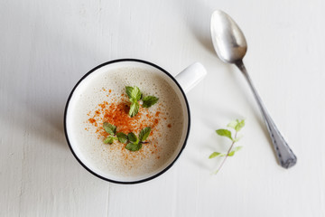 Vegetarian soup with coconut milk, apple and dates