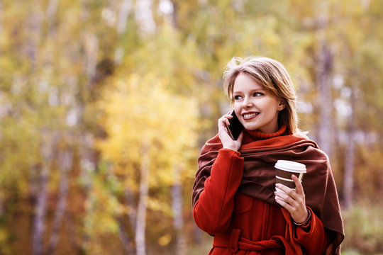 Business Woman With To Go Coffee