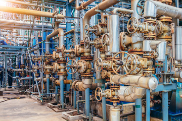 Industrial zone,The equipment of oil refining,Close-up of industrial pipelines of an oil-refinery...