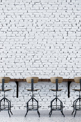 white brick wall and stool bar