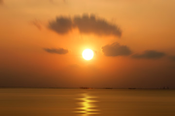 Fototapeta na wymiar Sunset sky and clouds over the lake.