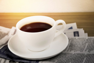 Black coffee on office table background