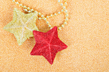 Red and gold star gliter decoration for christmas.