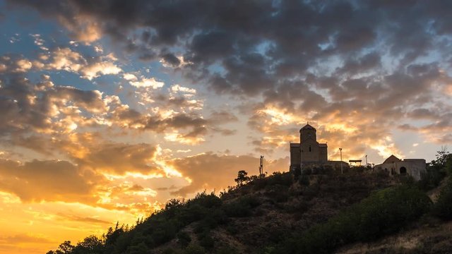 4K TBILISI, GEORGIA - August 14, 2015: Sunrise at Tabor Monastery of the Transformation (Kharfukhi Turn) on the top of a small hill on the south east edge of town