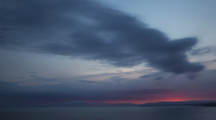 Fototapeta na wymiar Inspiring and tranquil sunset over sea.