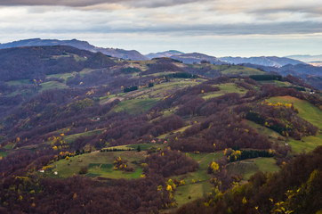 Fototapeta na wymiar Meadows and rolling hills in autumn, Bobija mountain, west Serbia