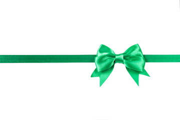 green ribbon with bow for packaging, isolated on white.