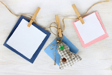 garland for holiday decorations/ Christmas tree and blank card for lettering hanging from a rope on...