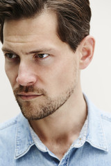 Close up of handsome man, looking away