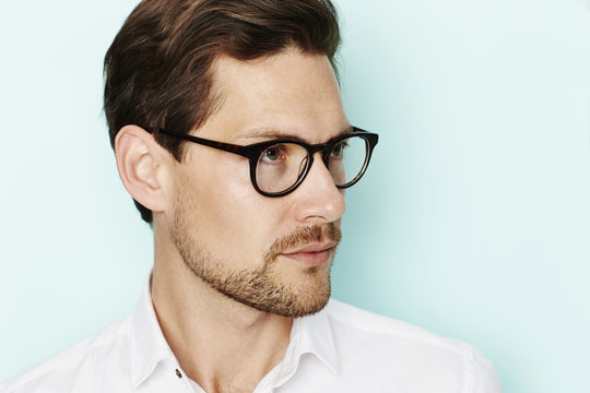 Man in spectacles, studio shot