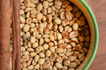 coffee beans with cinnamon sticks for background