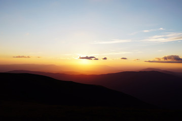 Fototapeta na wymiar Beautiful mountain peaks with sunset