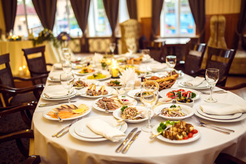 Table set for an event party or wedding reception. 
