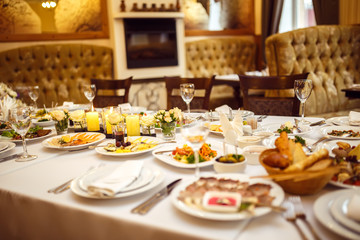 Table set for an event party or wedding reception. 
