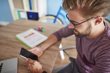 Naklejka premium Using technology in the home office
