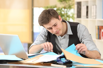 Incompetent messy businessman with disorganized desk