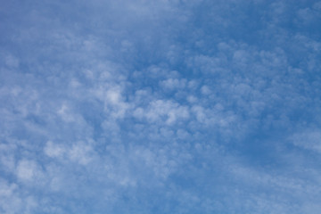 White clouds on a blue sky. Selective focus