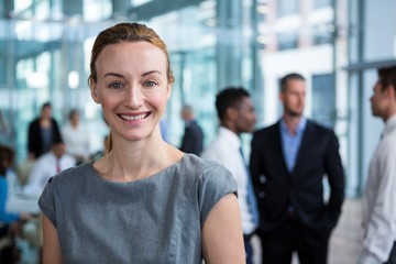 Smiling businesswoman in office