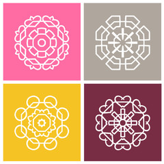 Four beautiful circular ornament. Mandala.Stylized flowers. Set of vector logos.