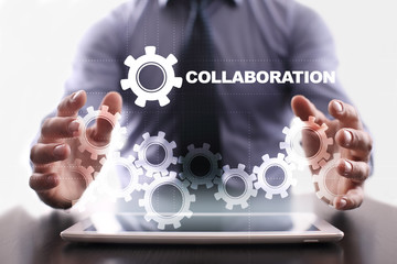 Businessman is using tablet pc and selecting collaboration