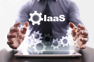 Businessman is using tablet pc and selecting iaas