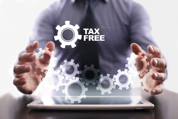 Businessman is using tablet pc and selecting tax free