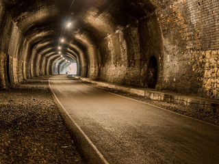 Inside one of the old railway tunnels on the Monsal trail, Peak District, Derbyshire, UK