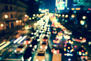Artistic style -Defocused urban abstract texture bokeh city lights & traffic jams in the background...